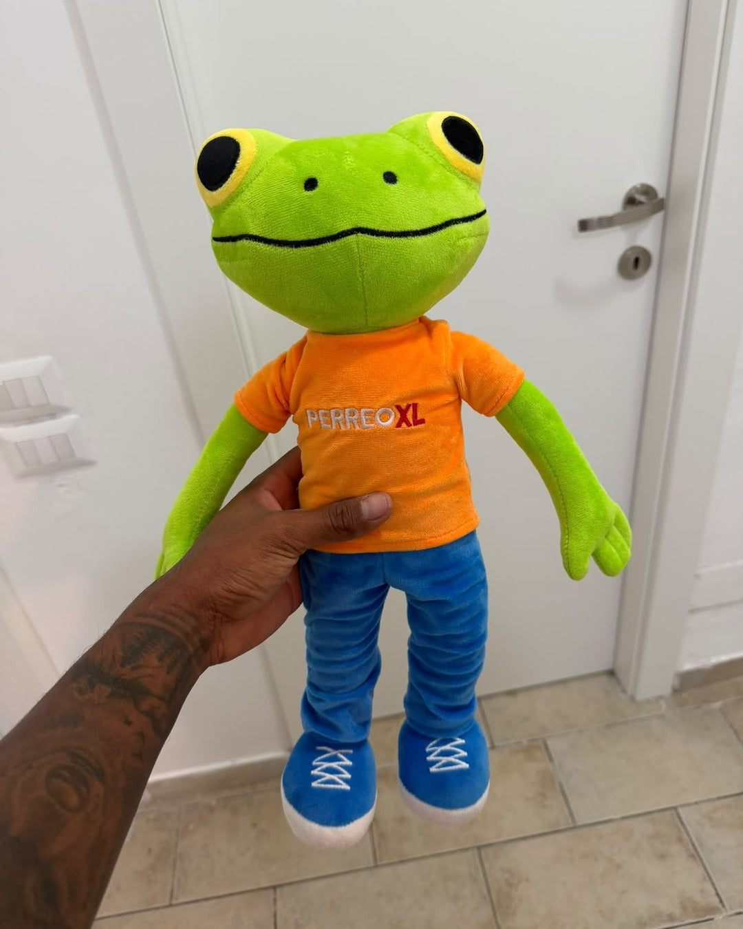 The PERREOXL frog plush, front view